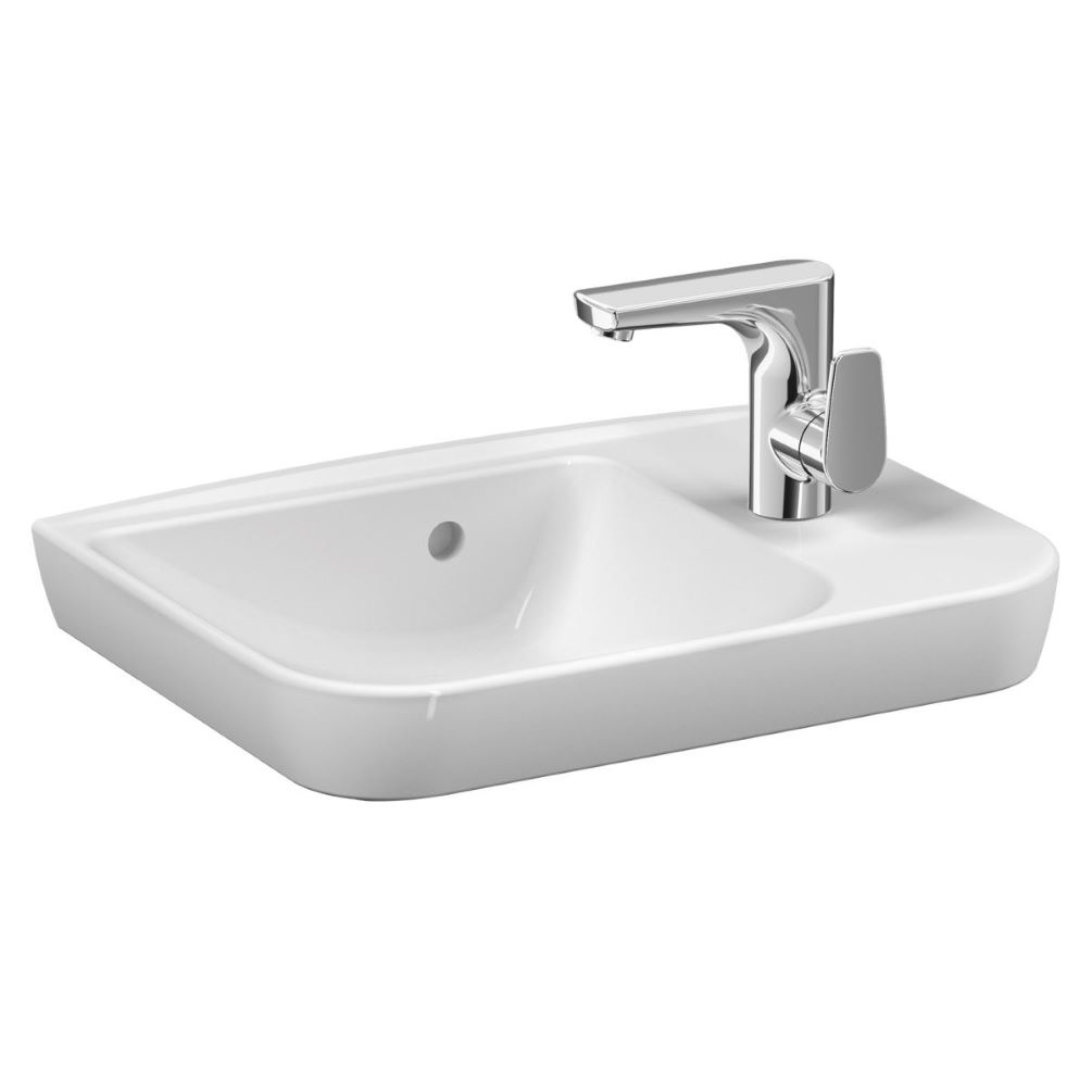 Product lifestyle photo of white compact countertop basin, right handed with one tap hole and one overflow hole.